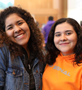 decorative - photo of two students with carefree smiles